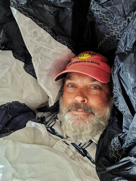 Russ resting on spinnaker