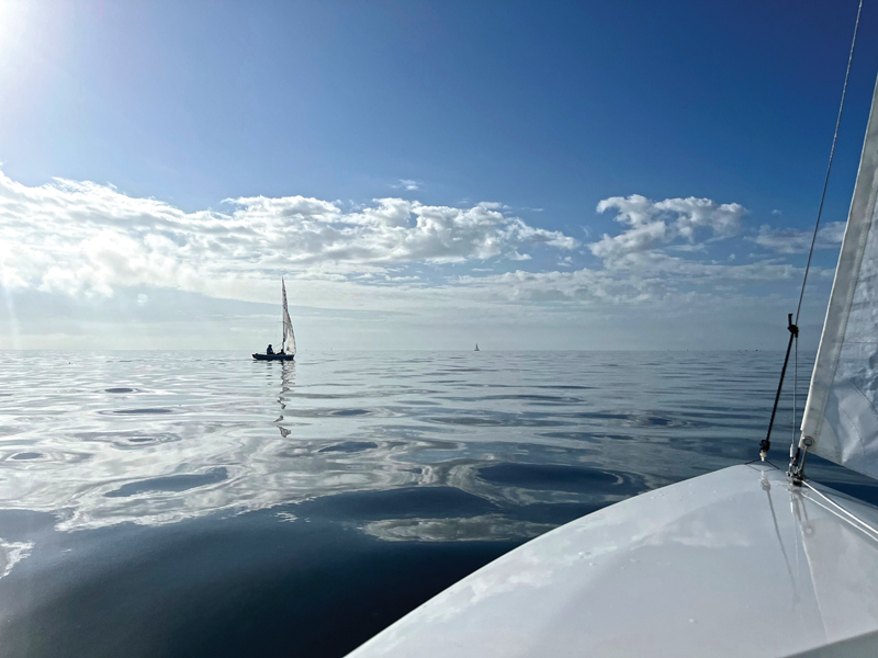 calm water while sailboat racing